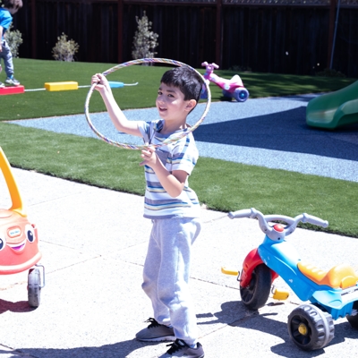Child playing outside Photo